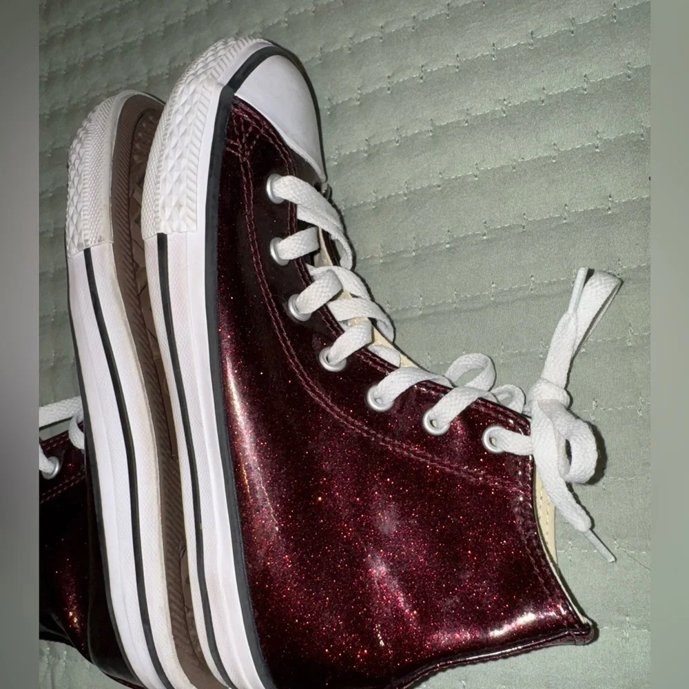 Shimmer black cherry high top Chuck Taylor converse big kids size 3. GUC
